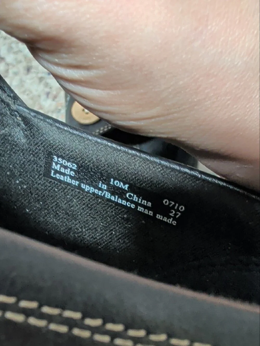 Clarks Black Leather Slip-On Loafers with Contrast Stitching and Button Accent